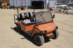 Orange Club Car 4 passenger golf cart