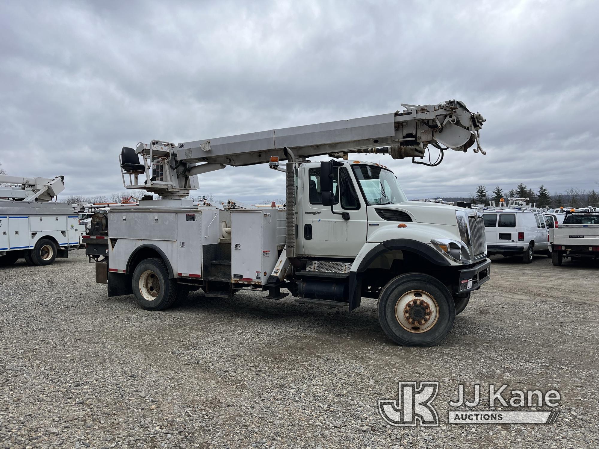 (Shrewsbury, MA) Altec DM47-TR, Digger Derrick rear mounted on 2008 International 7300 4x4 Utility T