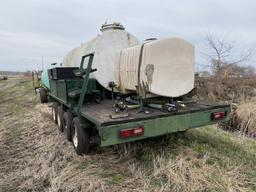 NURSE TANK, 1200-GALLON STAINLESS STEEL TANK ON 4-AXLE TRAILER