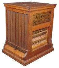 Spool Cabinet, J. & P. Coats' oak top load w/7 glass columns on two sides &