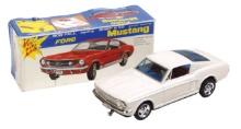 Toy Ford Mustang, tin battery-operated "Bump 'N Go" in orig box, Mint untes