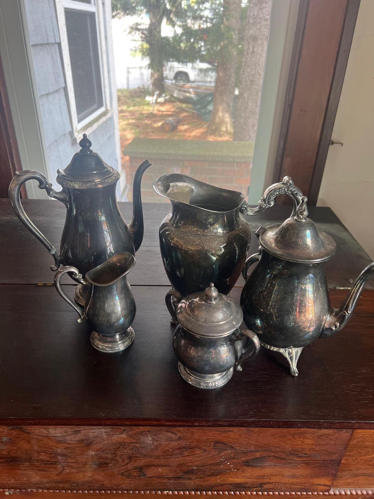 silver plated tea pots and creamers