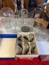 clear glass dish lot in basement