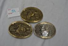 The Sydney Iowa Rodeo 1983, 1985, and 1986 Belt Buckles