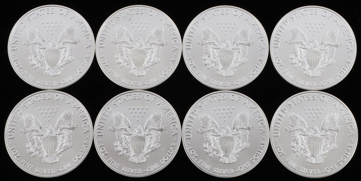 LOT OF 8 1 OZ AMERICAN SILVER EAGLE $1 COINS