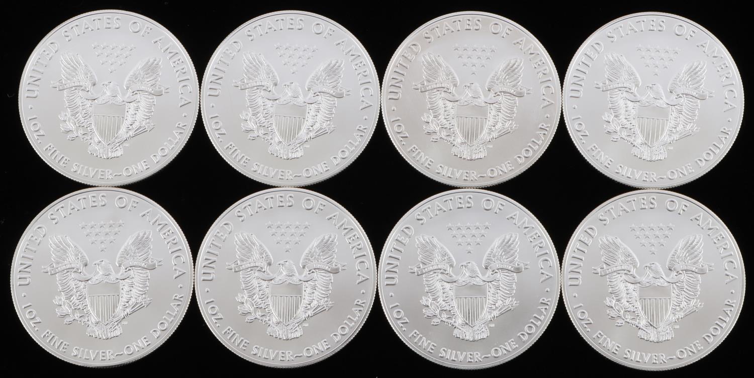 LOT OF 8 1 OZ AMERICAN SILVER EAGLE $1 COINS