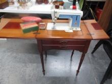 SINGER SEWING MACHINE IN CABINET