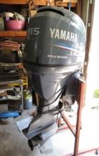 2004  115 hp Yamaha 4 stroke outboard motor with prop, controls, wire harness, and steel stand,  ...