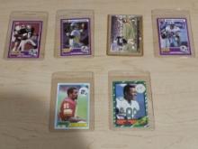 Assorted NFL Players Trading Cards in Plastic Protective Sleeves