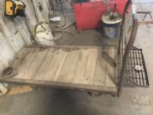 METAL CART WITH WOOD IN CENTER ON WHEELS