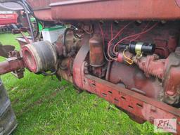 Farmall Super M tractor, narrow front end, gas