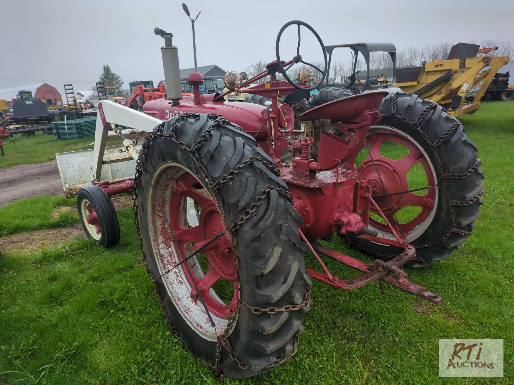 McCormick Farmall H with front blade, wide front end, draw bar, PTO