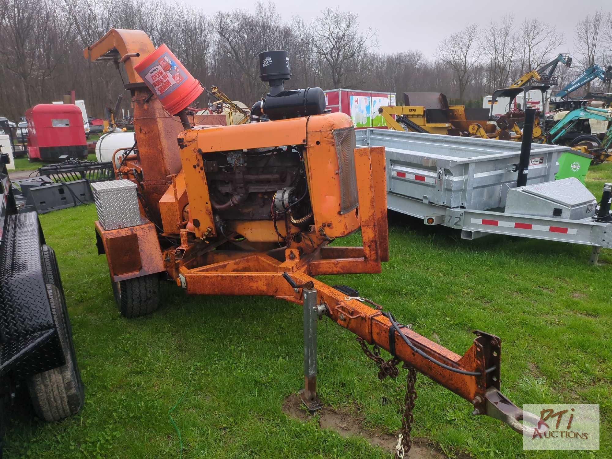 Tow behind wood chipper, gas engine, 77,115 hrs