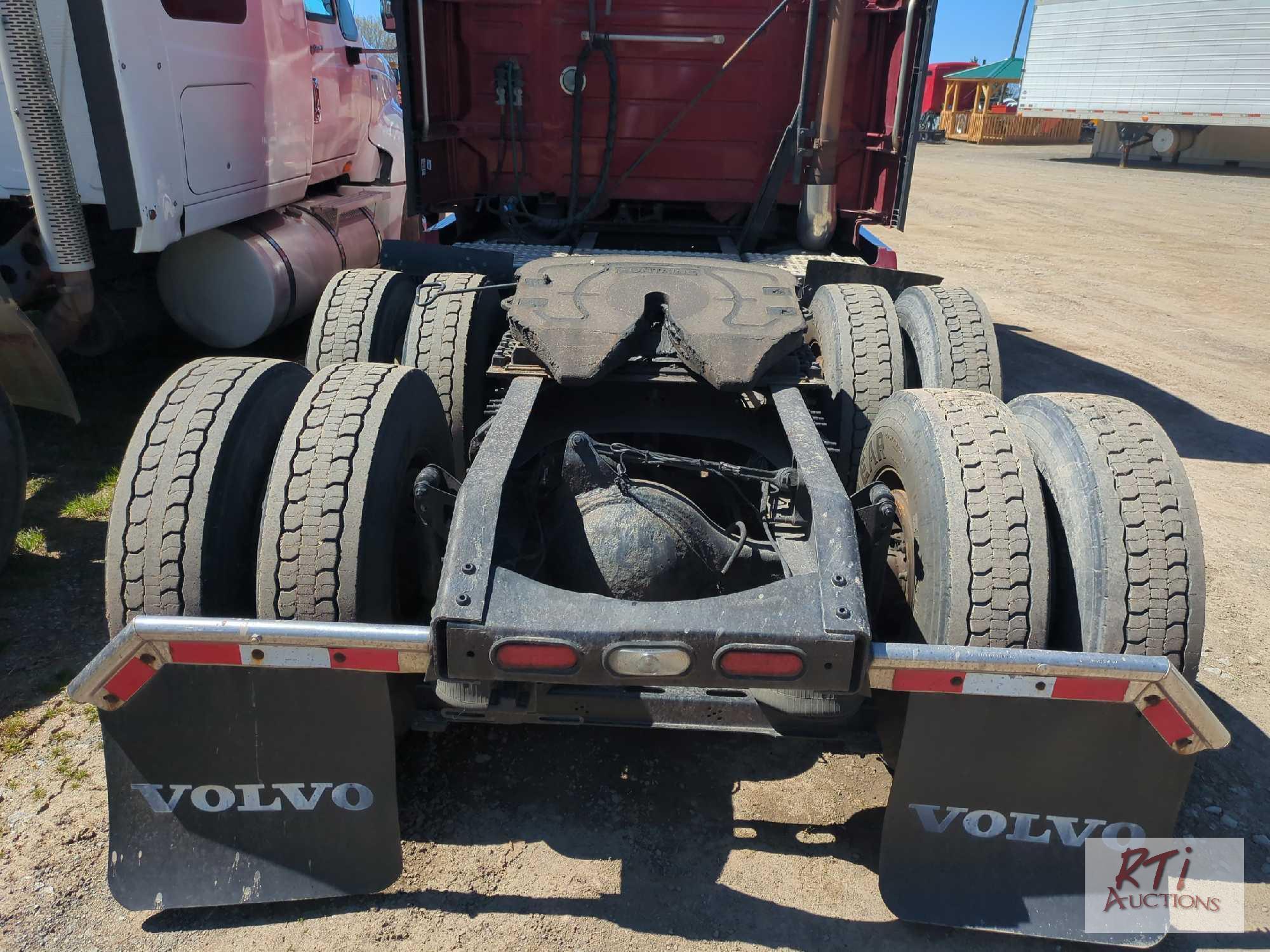 2012 Volvo tandem truck tractor with high sleeper, Cummins 550hp, 13 speed, good tires, very clean,