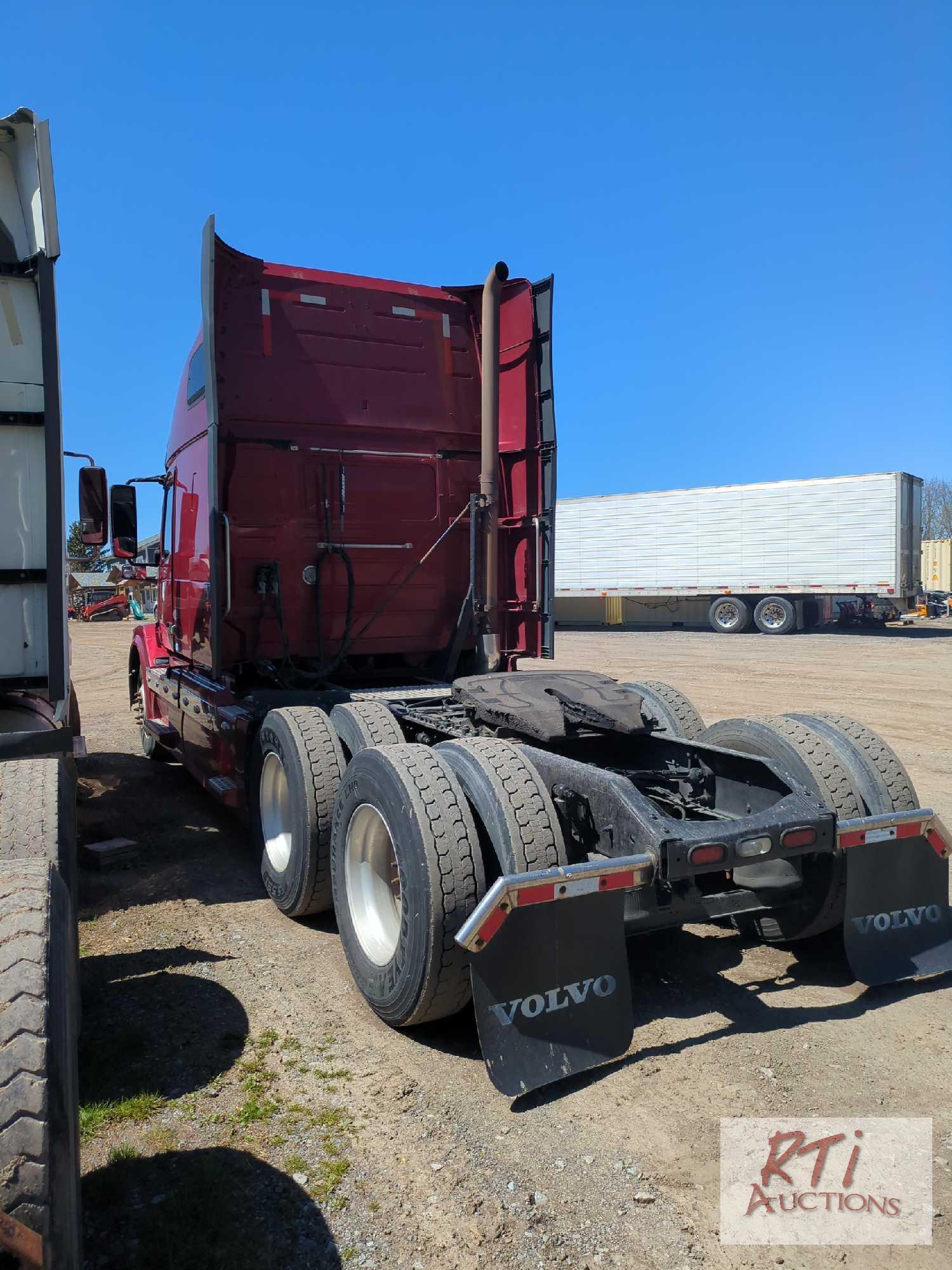 2012 Volvo tandem truck tractor with high sleeper, Cummins 550hp, 13 speed, good tires, very clean,