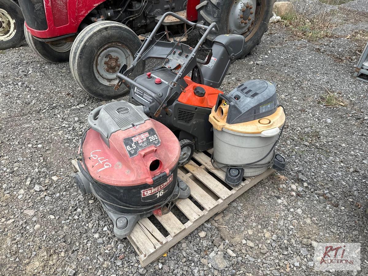 Pallet with (2) shop vacs and Husqvarna walk behind snowblower