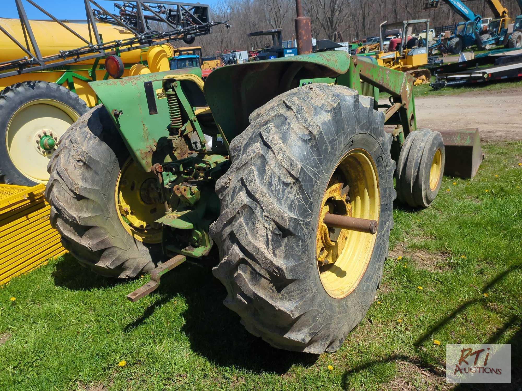 John Deere 2640 tractor with loader, rides and drives, runs okay, no 3 pt hitch