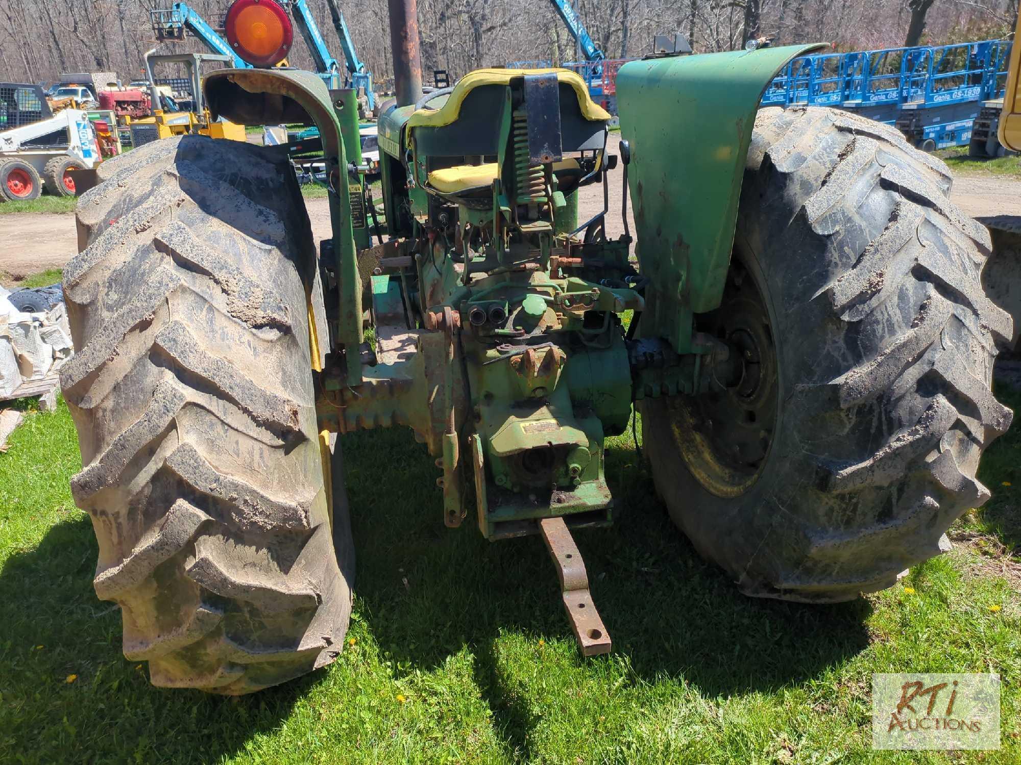 John Deere 2640 tractor with loader, rides and drives, runs okay, no 3 pt hitch