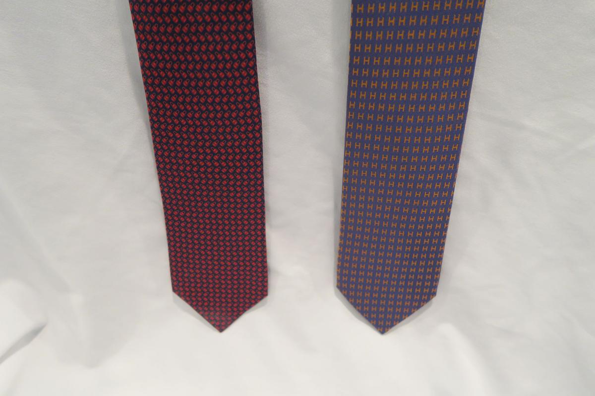 (2) Hermes Silk Ties - Twillbi Locks of Love design in red/blue; Faconnee H Bicolore in violet/orang