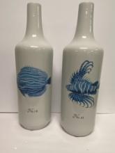 PAIR OF LARGE CERAMIC BOTTLES WITH NAUTICAL THEME