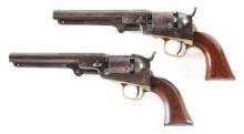 (A) RARE PAIR OF VERTICAL CASED COLT MODEL 1849 POCKET PERCUSSION REVOLVERS.