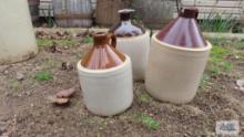 Three brown jugs