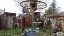 assorted chimes and bird feeders