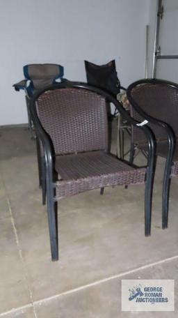 Pair of metal and wicker style chairs