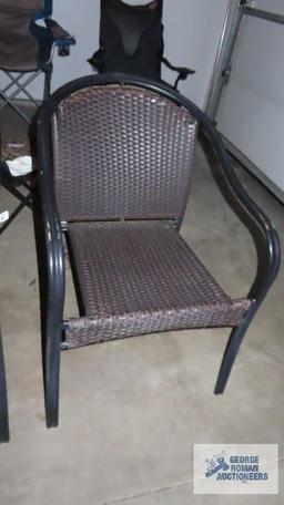 Pair of metal and wicker style chairs