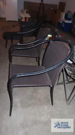 Pair of metal and wicker style chairs