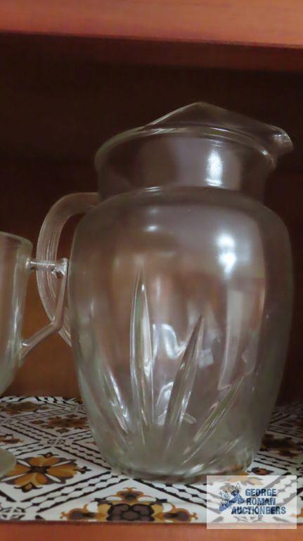 Glass pitcher, mugs, and salt and pepper shakers