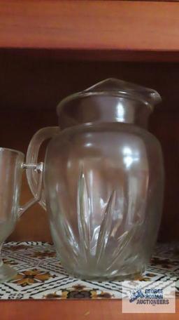 Glass pitcher, mugs, and salt and pepper shakers