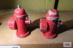 miniature cast iron fire hydrants and plastic boat