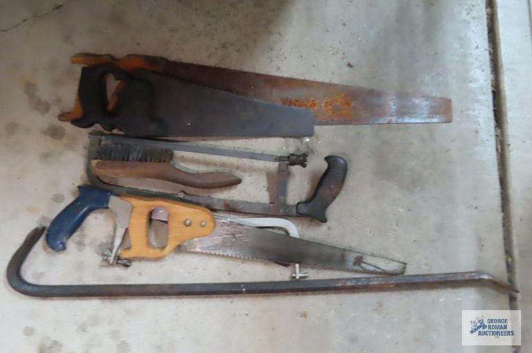 lot of saws, heavy duty crowbar and etc