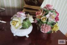 Radnor flower figurine and other flower figurine, one is cracked