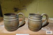 pair of copper mugs