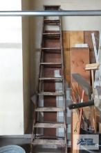 wooden 10 ft step ladder in garage