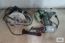 Black & Decker circular saw with drills and 12 volt drop light