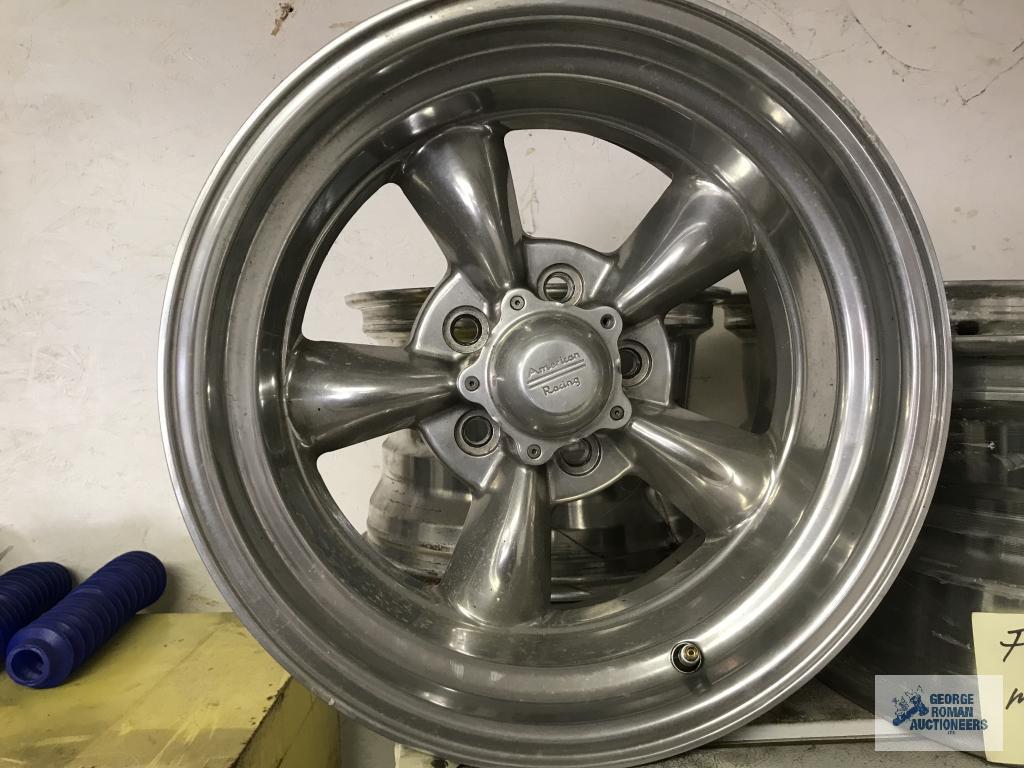 (4) ALUMINUM RIMS, POSSIBILLY FOR FORD OR MOPAR