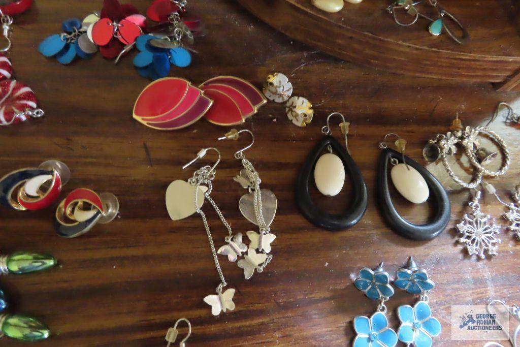 large assortment of earrings