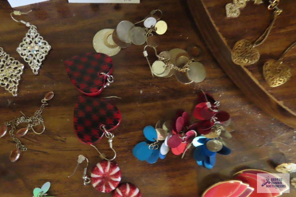 large assortment of earrings