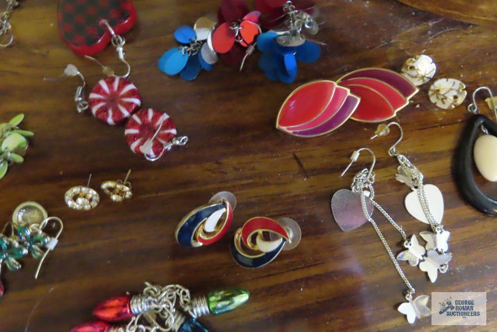 large assortment of earrings