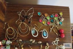 large assortment of earrings