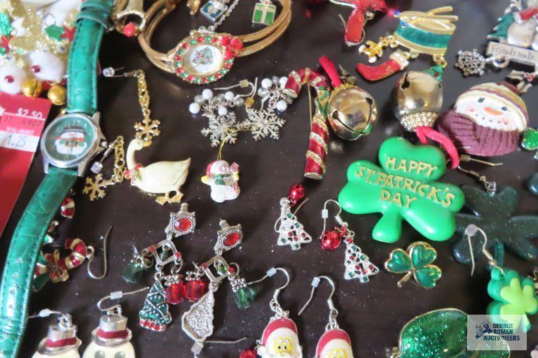 large assortment of holiday jewelry