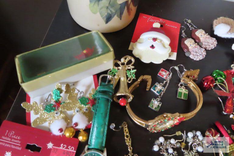 large assortment of holiday jewelry