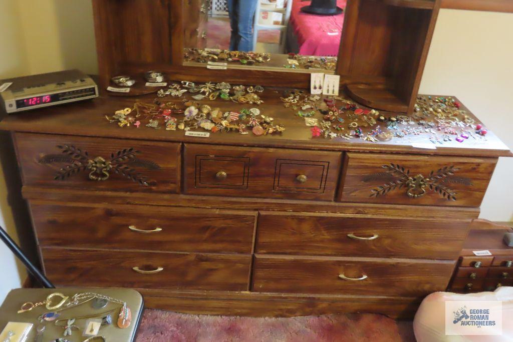 carved mirrored headboard, dresser with mirror and chest