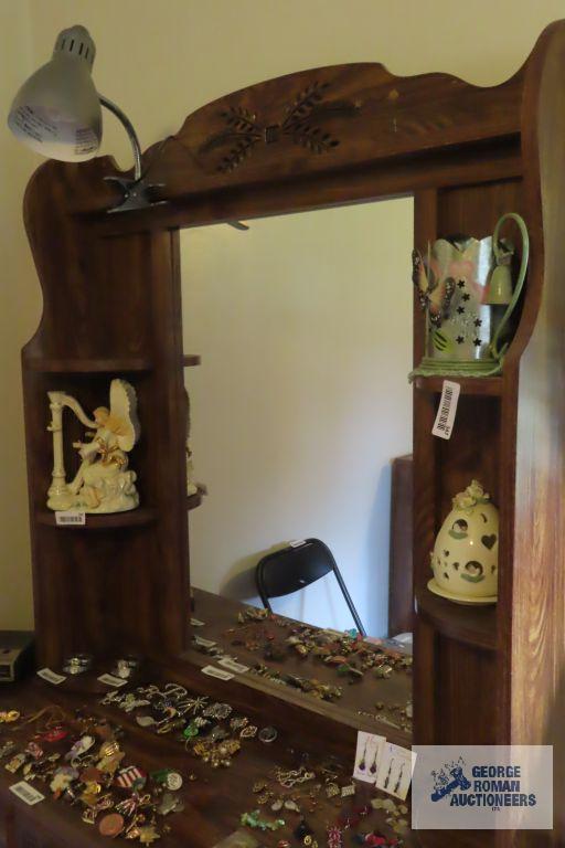 carved mirrored headboard, dresser with mirror and chest