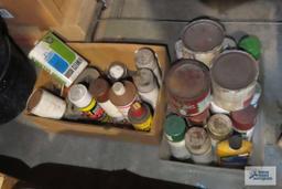 lot of spray paint and etc