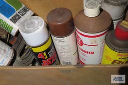 lot of spray paint and etc