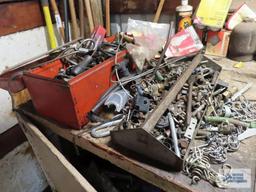 Lot of hardware, tools and etc on under and in front of bench